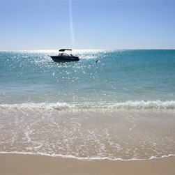 Our boat moored at our camp