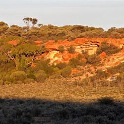 Setting sun lighting up the face of the range