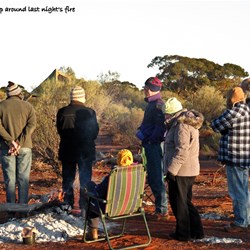 Warming up besides last night's fire