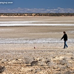 The boys playing soccar