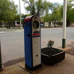 Old bowsers line the footpaths