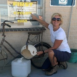 Michelle with the first bike to cross the Nullarbor