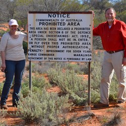 Fiona and I by the sign