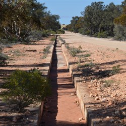 Drains like this around Maralinga capture the rain run off and drain it to the dam