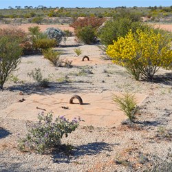 Large tie downs that once held a Nuclear device in place
