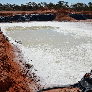 Large pits used during the drilling of Mulyawara 1
