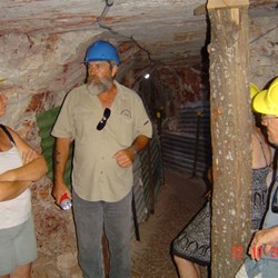 Peter the guide explaining the workings at the opal dirt level