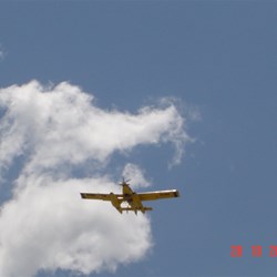 Fire Bomber going overhead after filling