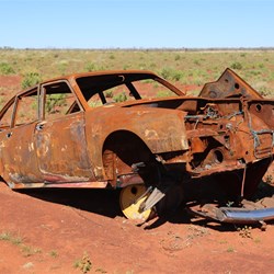 A Citroen dumped in the desert by aliens after a good probing