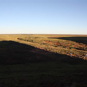 Surrounded by the shadows of the hills