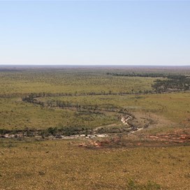 The creek snaking its way out to the east