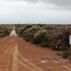 Balladonia Road turns to sand, then to mud.  Time to let down the tyres