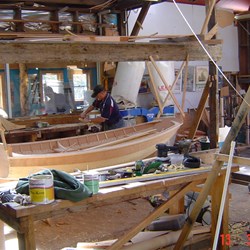 Dingy assembly area with a partially completed boat