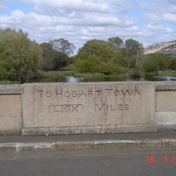 Distance to Hobart carved in the bridge stonework