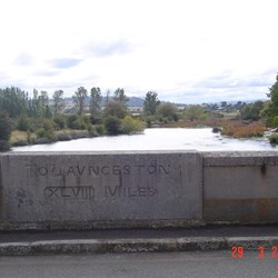 Distance to Launceston carved into the bridge stonework