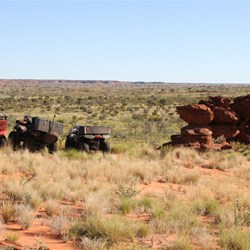 Quads by a high rocky outcrop