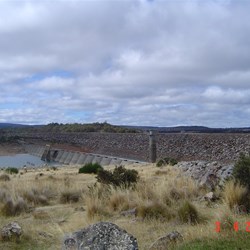 The dam at Miena, note the original wooden structure and the later arched brick wall remains