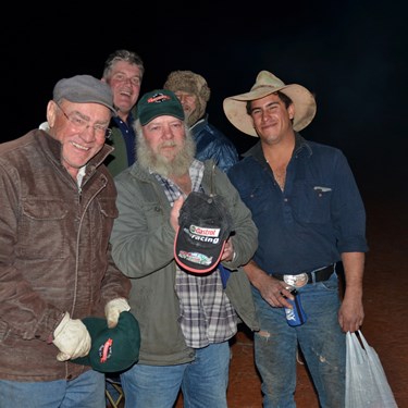 John displays the autographed cap that will go on display in the Kingoonya Hotel