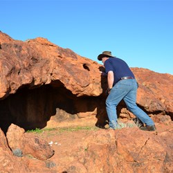 Mick checking out a small cave