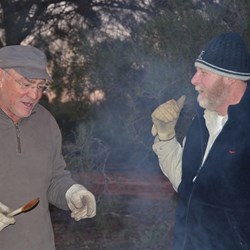 Larry and Stephen chat while cooking tea