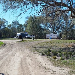 walking the rtack past the riverside campsites in the cool of early morning