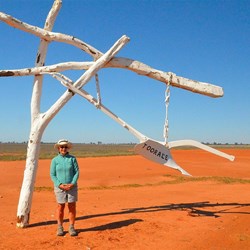 Me at Toorale National Park sign..love that red dirt and blue sky so much