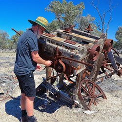 John wandering around the old machinery at Dunlop farm