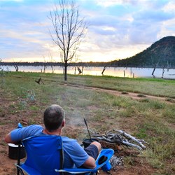 campfire while the sun sets