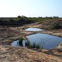 A series of water collection ponds on Cave Hill