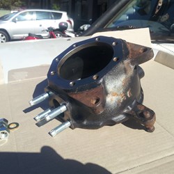 Broken stud removed and four new ones fitted with Loctite