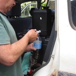 Step 1.  Drain the new oil into used water bottles