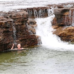 Ali enjoying a dip at Fruit Bat Falls