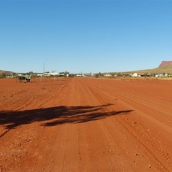 Wide, graded road into Kintore Community
