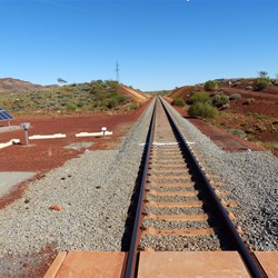 Crossing the mine rail line into Weeli Wolli
