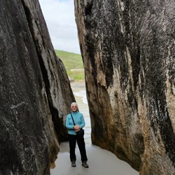 me posing in the small gap in rocks near Elephant rocks