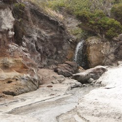 Natural spring fed waterfall at the beach