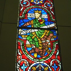 The stained glass panels tell many stories.