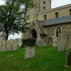 Holywell clustered about with gravestones.