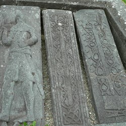Detail of intricate carving on the gravestones