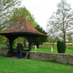 Lych gate at Connington, with some of the yews on the RHS
