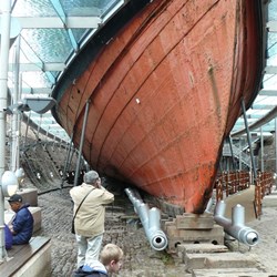 The iron hull along with air ducts and support mechanisms to protect the ship from further decay.