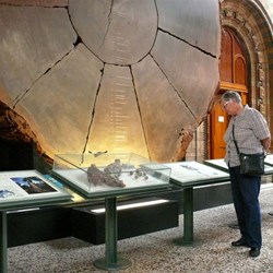 Contemplating the Giant Redwood marked with significant dates back through 2000 years.
