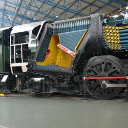 A steam locomotive cut away to show the internal workings.