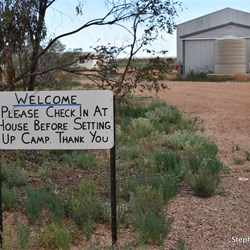 Sign letting you know that ypu must pay your $20 fee before setting up