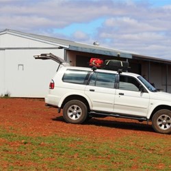Parked by the locked racing amenities building