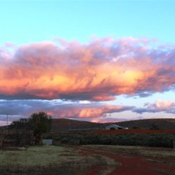 Setting sun reflecting off a cloud bank in the East