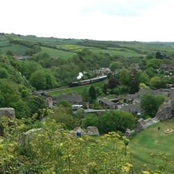 Looking down from Corfe castle at the little steam train.