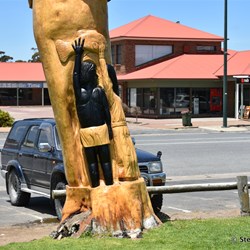Giant hand crafted Pelican from an old Pine Tree