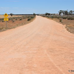 Looking back at Cal Lal Road from the Border