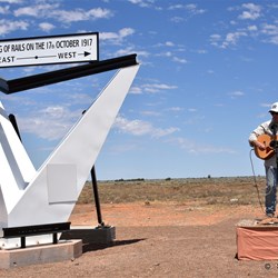 Mike Roberts performs the song he wrote especially for the event